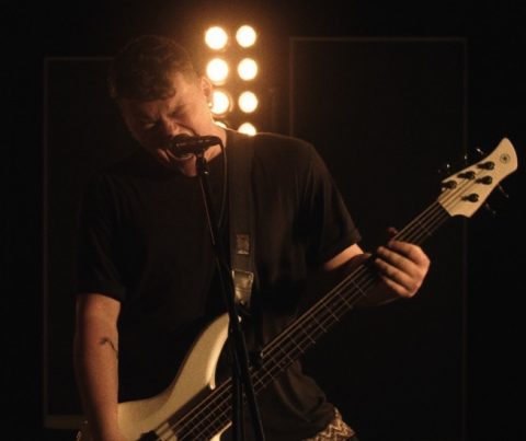 a man playing bass